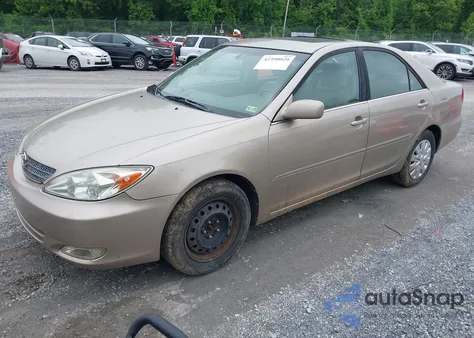 2003 Toyota Camry Xle z USA, uszkodzony, nr VIN 4T1BE30K83U168989